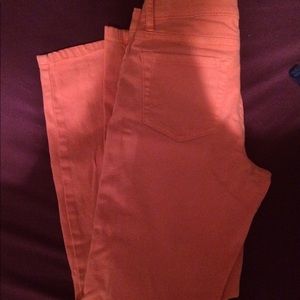 Peach colored skinny leg pants